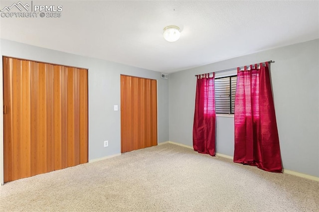 3870 Chinawood Ct, Colorado Springs, CO 80918 - unfurnished bedroom featuring carpet and baseboards