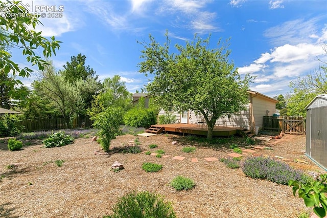 3870 Chinawood Ct, Colorado Springs, CO 80918 - view of yard with a deck