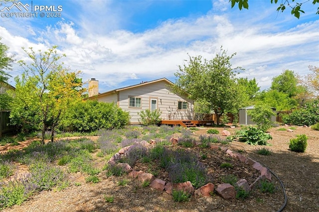3870 Chinawood Ct, Colorado Springs, CO 80918 - view of yard featuring a deck