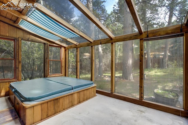1015 Lafayette Ave, Woodland Park, CO 80863 - sunroom / solarium featuring a hot tub and vaulted ceiling