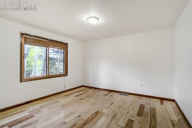 1015 Lafayette Ave, Woodland Park, CO 80863 - unfurnished room with baseboards and light wood-style floors