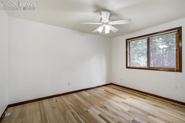 1015 Lafayette Ave, Woodland Park, CO 80863 - spare room featuring baseboards, light wood finished floors, and a ceiling fan