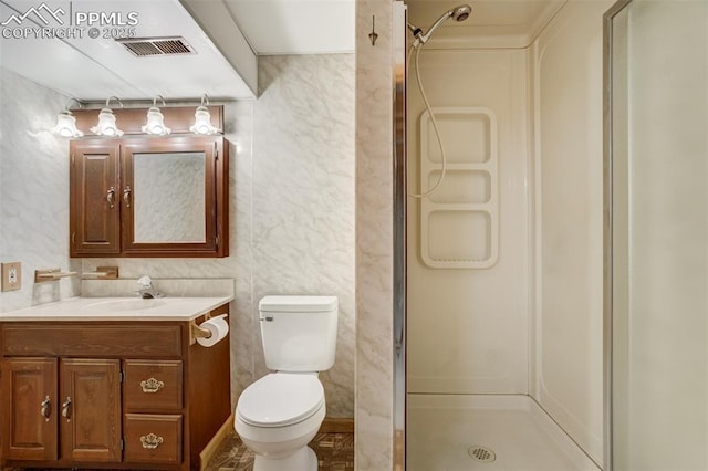1015 Lafayette Ave, Woodland Park, CO 80863 - full bath with a stall shower, vanity, and toilet