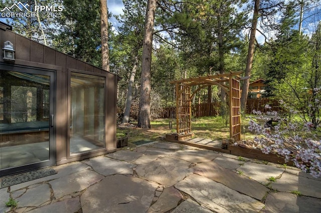 1015 Lafayette Ave, Woodland Park, CO 80863 - view of patio featuring view of wooded area