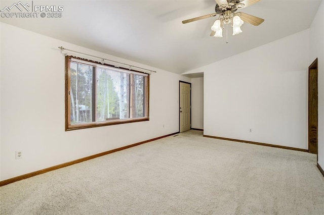 1015 Lafayette Ave, Woodland Park, CO 80863 - unfurnished room with light colored carpet, lofted ceiling, and baseboards