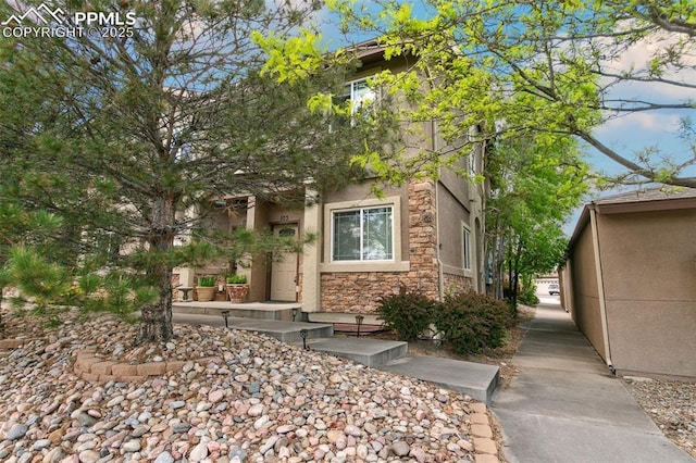 1502 York Rd Unit 103, Colorado Springs, CO 80918 - doorway to property featuring stone siding