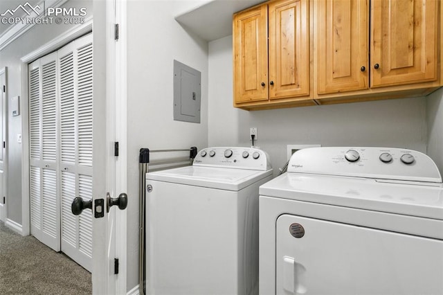 1502 York Rd Unit 103, Colorado Springs, CO 80918 - laundry room with cabinet space, independent washer and dryer, electric panel, carpet, and baseboards