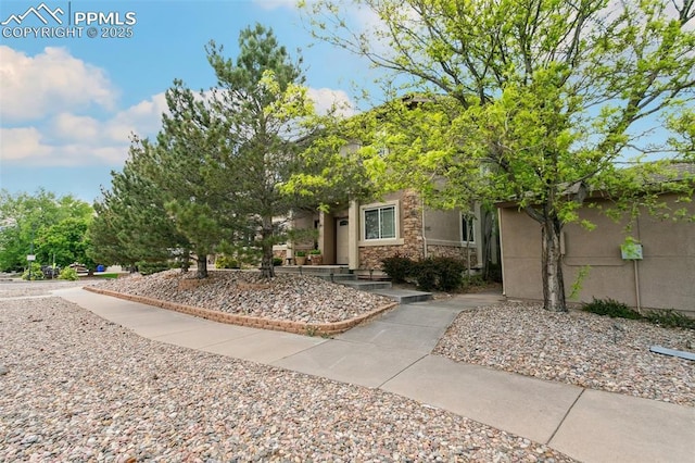 1502 York Rd Unit 103, Colorado Springs, CO 80918 - property entrance with stone siding and stucco siding