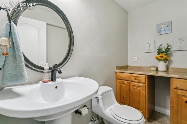 1502 York Rd Unit 103, Colorado Springs, CO 80918 - bathroom with toilet and a sink