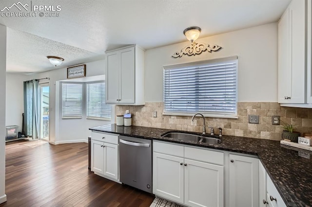 1155 Hallamwood Dr, Colorado Springs, CO 80911 - kitchen featuring dishwasher, a sink, dark wood finished floors, healthy amount of natural light, and a textured ceiling