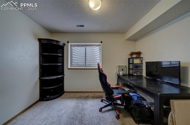 6938 Big Timber Dr, Colorado Springs, CO 80923 - office with carpet flooring, a textured ceiling, and baseboards