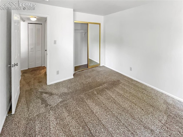 412 Cobblestone Dr, Colorado Springs, CO 80906 - unfurnished bedroom featuring carpet, baseboards, and a closet
