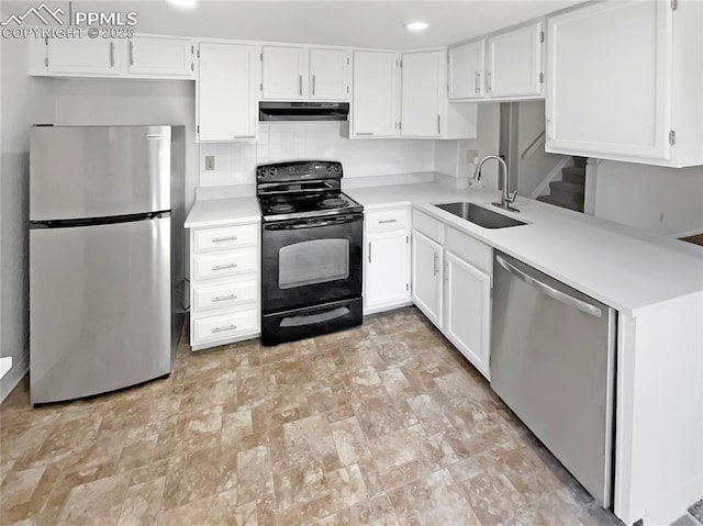 412 Cobblestone Dr, Colorado Springs, CO 80906 - kitchen with stainless steel appliances, a sink, under cabinet range hood, white cabinetry, and recessed lighting