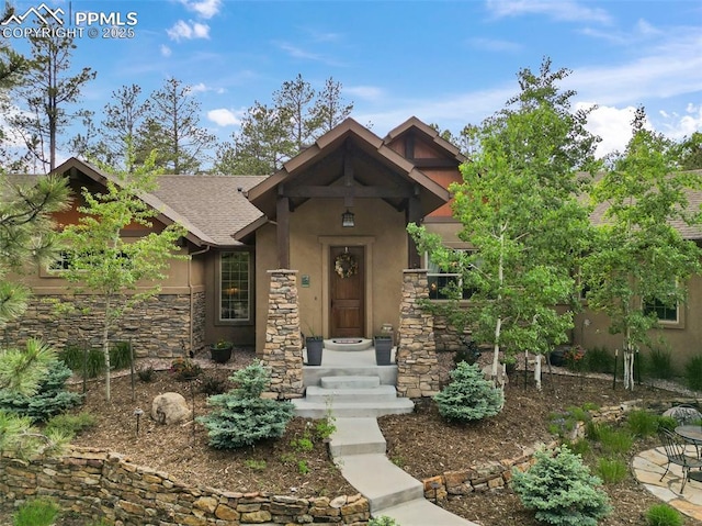 11720 Smokey Hill Grv, Colorado Springs, CO 80908 - craftsman inspired home featuring stucco siding, stone siding, and roof with shingles