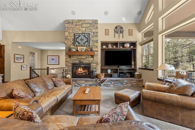 11720 Smokey Hill Grv, Colorado Springs, CO 80908 - living area with a stone fireplace and carpet