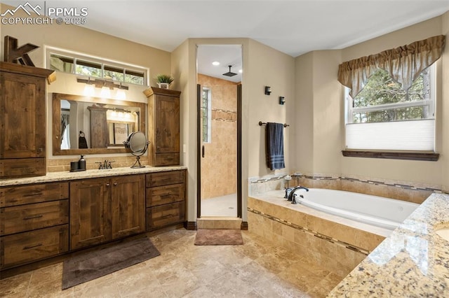 11720 Smokey Hill Grv, Colorado Springs, CO 80908 - full bath featuring vanity, healthy amount of natural light, and a stall shower