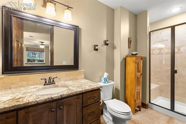 11720 Smokey Hill Grv, Colorado Springs, CO 80908 - bathroom with vanity, a stall shower, and a ceiling fan
