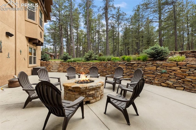11720 Smokey Hill Grv, Colorado Springs, CO 80908 - view of patio with a fire pit