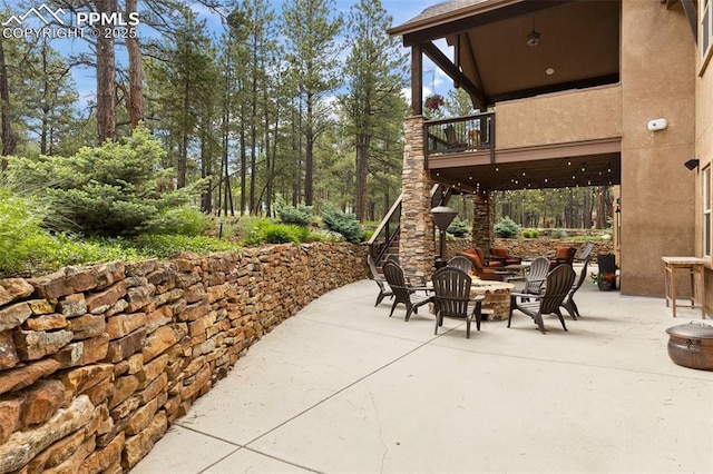 11720 Smokey Hill Grv, Colorado Springs, CO 80908 - patio / terrace featuring a patio area and a fire pit