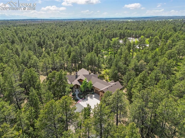 11720 Smokey Hill Grv, Colorado Springs, CO 80908 - view from above of property featuring a heavily wooded area