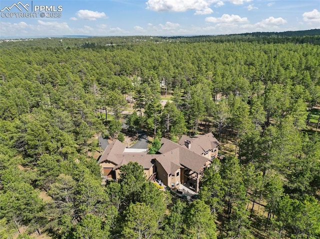 11720 Smokey Hill Grv, Colorado Springs, CO 80908 - view of subject property featuring a forest