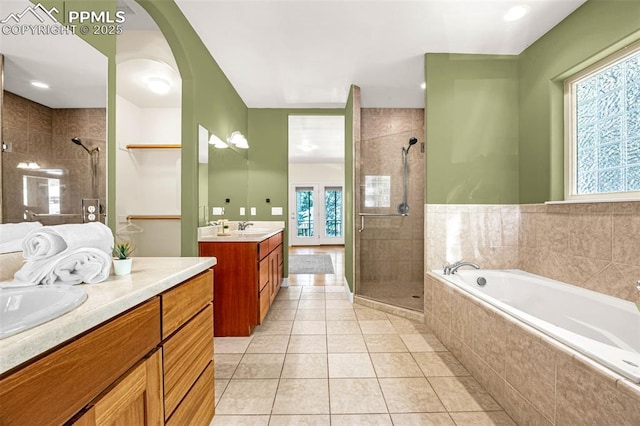 4775 Neeper Valley Rd, Manitou Springs, CO 80829 - bathroom with a stall shower, two vanities, a bath, and tile patterned flooring