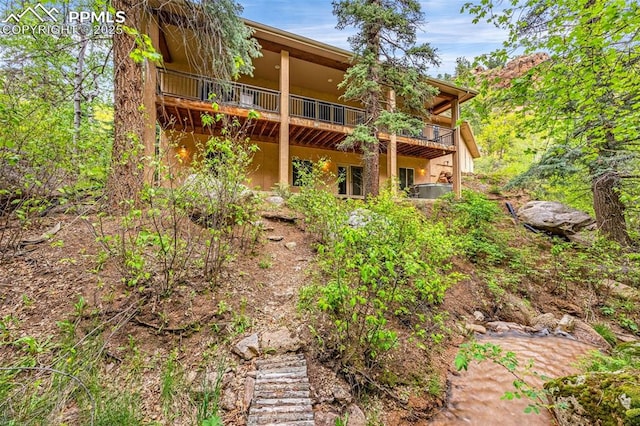 4775 Neeper Valley Rd, Manitou Springs, CO 80829 - back of property with a wooden deck