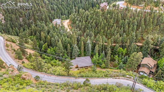 4775 Neeper Valley Rd, Manitou Springs, CO 80829 - bird's eye view of a heavily wooded area
