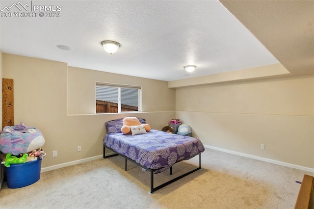 6755 Akerman Dr, Colorado Springs, CO 80923 - bedroom featuring carpet floors, baseboards, and a textured ceiling
