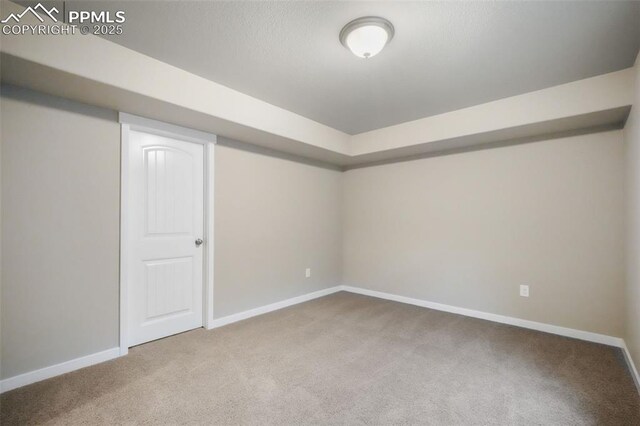 6015 Trappers Tale Ct, Colorado Springs, CO 80923 - basement with carpet floors and baseboards