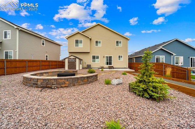 10552 Summer Ridge Dr, Peyton, CO 80831 - back of house with a fenced backyard and a patio area