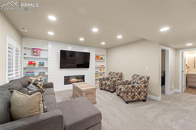 10552 Summer Ridge Dr, Peyton, CO 80831 - living room with recessed lighting, a fireplace, light colored carpet, and baseboards