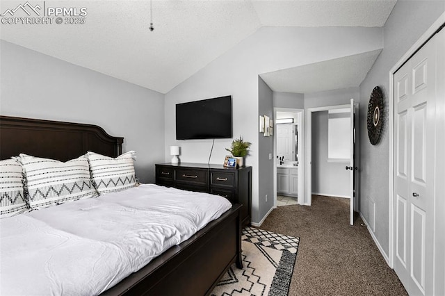 2280 Lisa Dr, Colorado Springs, CO 80915 - bedroom with vaulted ceiling, carpet, a closet, ensuite bathroom, and baseboards