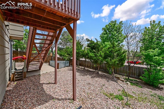 2280 Lisa Dr, Colorado Springs, CO 80915 - fenced yard with stairway and a patio