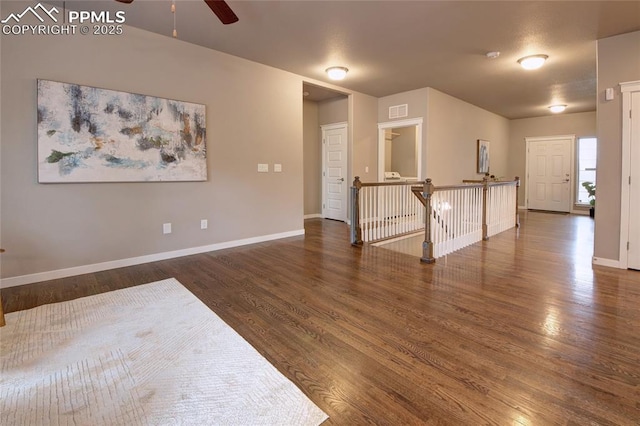 4228 Notch Trl, Colorado Springs, CO 80924 - spare room with a ceiling fan, wood finished floors, and baseboards