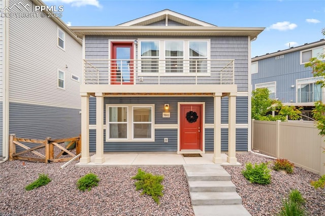 5840 Thurless Ln, Colorado Springs, CO 80927 - view of front of house with a balcony and a porch
