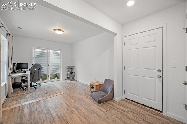 5840 Thurless Ln, Colorado Springs, CO 80927 - office featuring wood finished floors and baseboards