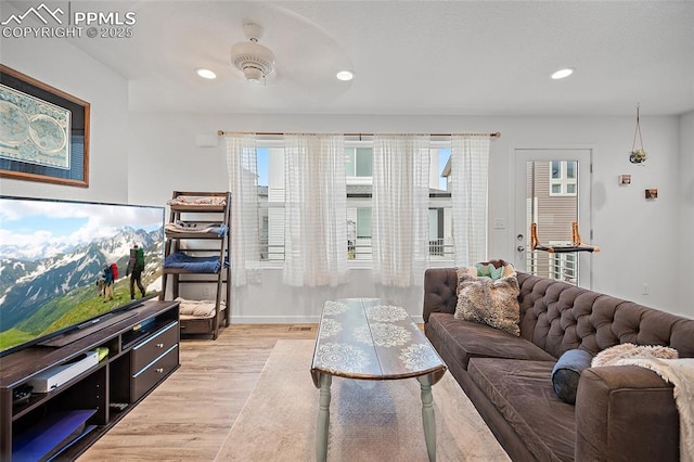 5840 Thurless Ln, Colorado Springs, CO 80927 - living room with light wood-style floors, recessed lighting, healthy amount of natural light, and baseboards