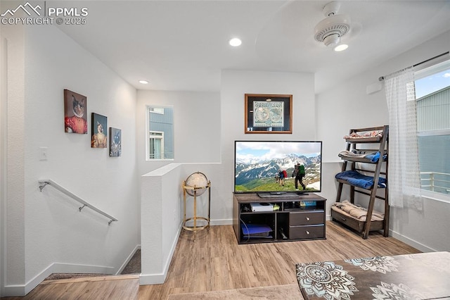 5840 Thurless Ln, Colorado Springs, CO 80927 - living area with an upstairs landing, baseboards, wood finished floors, and recessed lighting