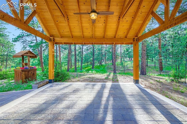 14820 Spiritwood Loop, Elbert, CO 80106 - view of patio / terrace featuring view of wooded area