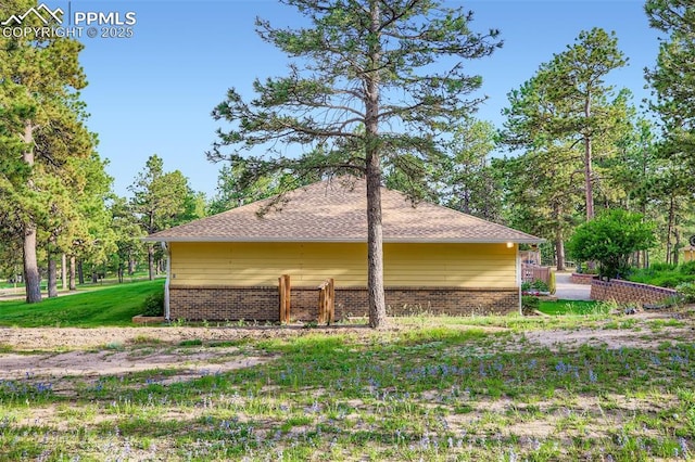 14820 Spiritwood Loop, Elbert, CO 80106 - view of home's exterior featuring brick siding
