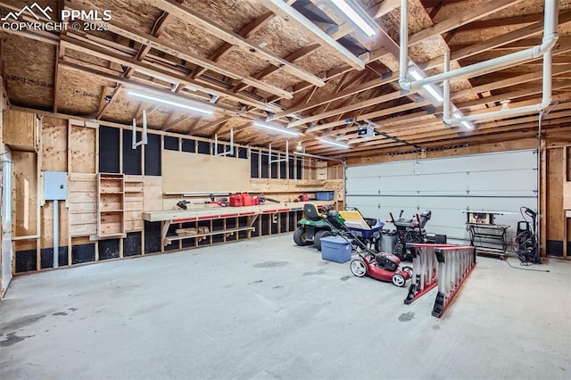 14820 Spiritwood Loop, Elbert, CO 80106 - garage featuring a workshop area