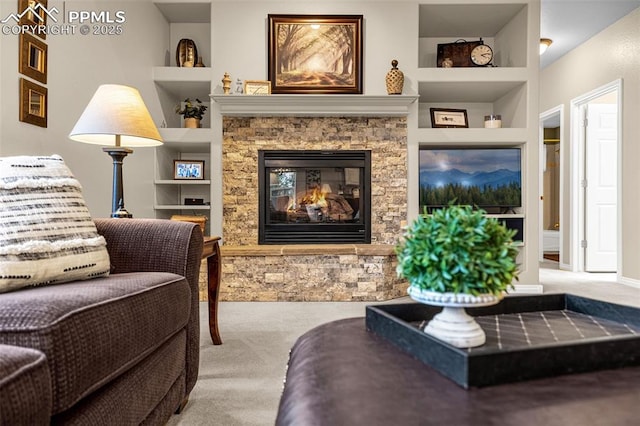 12265 Jones Park Ct, Colorado Springs, CO 80921 - living area with carpet floors, built in features, and a stone fireplace
