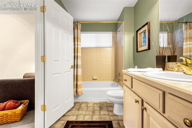12265 Jones Park Ct, Colorado Springs, CO 80921 - full bathroom with vanity, toilet, and shower / bath combo