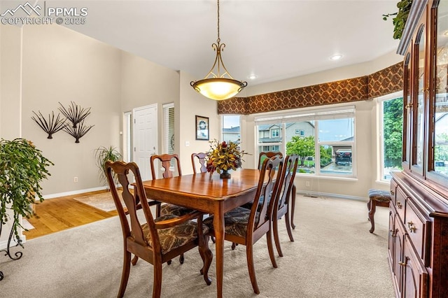 12265 Jones Park Ct, Colorado Springs, CO 80921 - dining area with baseboards, light carpet, and recessed lighting