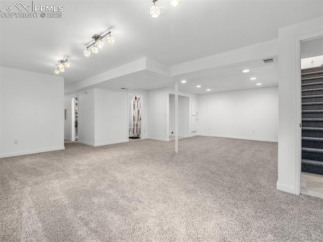1159 N Linda Ln, Pueblo West, CO 81007 - finished basement featuring stairs, recessed lighting, carpet, and baseboards