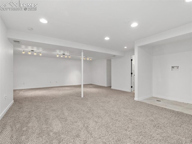1159 N Linda Ln, Pueblo West, CO 81007 - finished basement with light carpet, baseboards, and recessed lighting