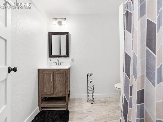 1159 N Linda Ln, Pueblo West, CO 81007 - full bath featuring vanity, toilet, and baseboards