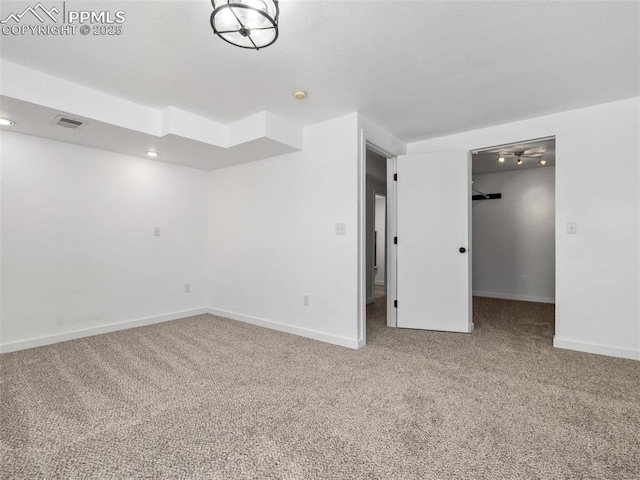 1159 N Linda Ln, Pueblo West, CO 81007 - spare room featuring carpet, baseboards, and recessed lighting