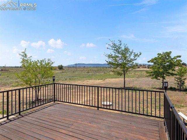 1159 N Linda Ln, Pueblo West, CO 81007 - deck with a view of countryside and a mountain view